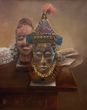 Load image into Gallery viewer, Decorative mask with intricate details and a feather on a brown background
