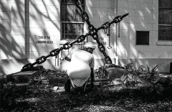 Woman pays tribute to the Unknown Slave by Dante Bowen